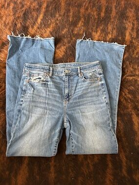 American Eagle Outfitters Light Wash Women's hi rise flare Jeans with Raw Hem